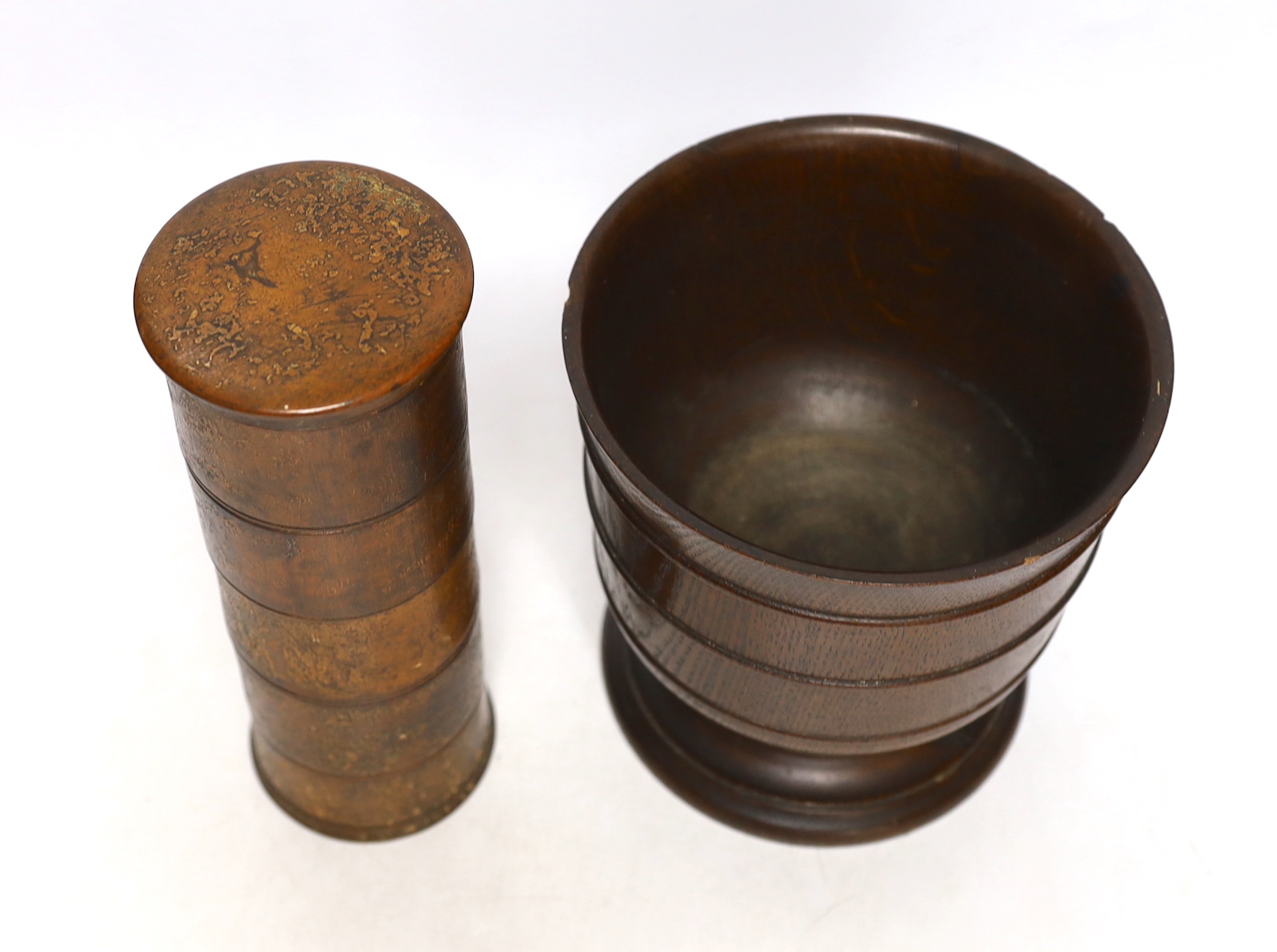 A Victorian treen spice tower and a turned oak mortar, 23cm high